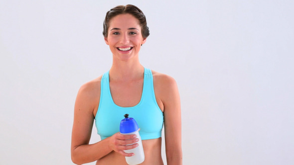 Fit Brunette Drinking From Sports Bottle Stock Footage Videohive